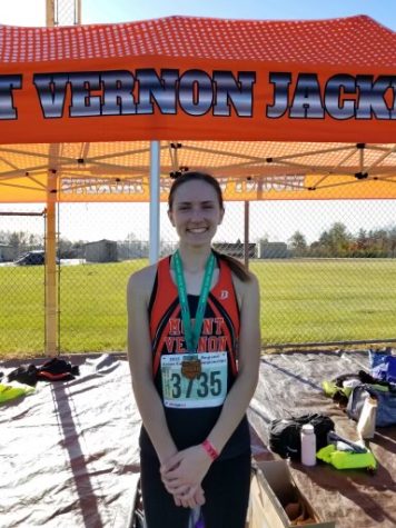 Sophia Zoldak runs to the State Cross Country Tournament