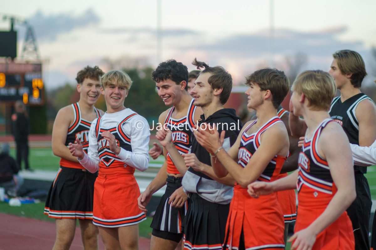 Cheerleaders dance for the crowd