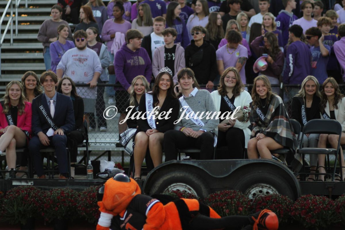 Homecoming Royalty Crosses the Field Friday Night