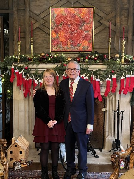 Lucy Peterson meets Gov. DeWine for a holiday party