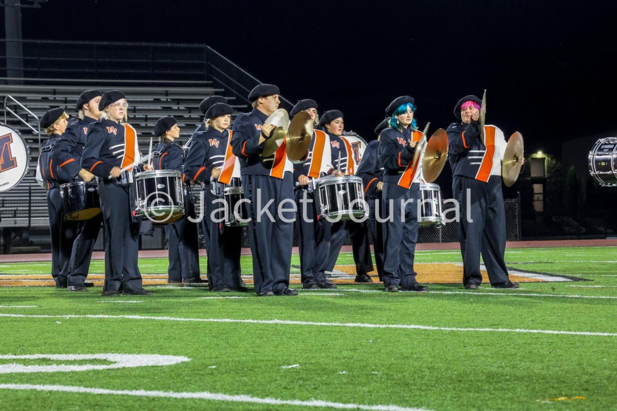 Friday Nights Shine with Community Spirit as Band, Cheerleaders, and Football Team Showcase Talents – Celebrating Our 2024 Marching Band's Season Finale!