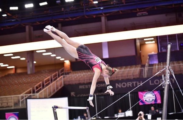 Reagan Frazee with a stunning performance on the bars.