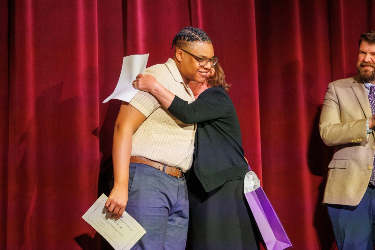 Senior Olufemi Odiah receives the Kenyon College Wright Family Scholarship