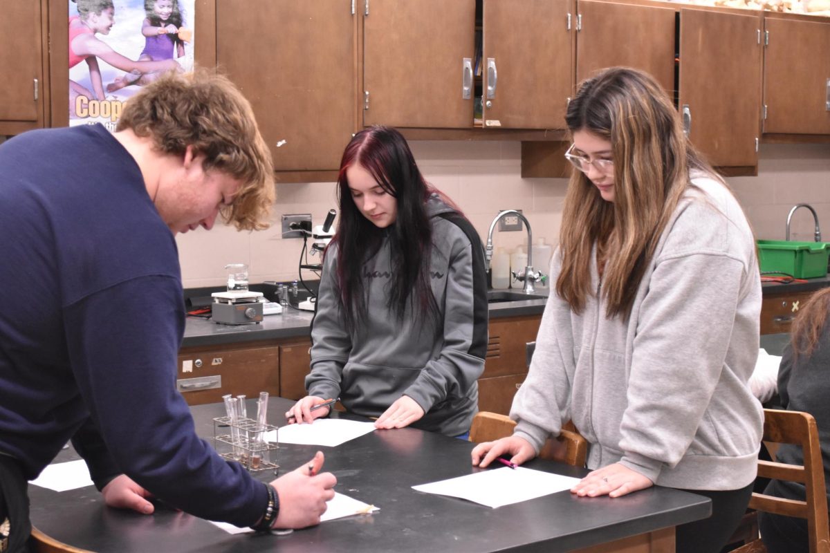 Mr. Farmer's science class prepares for the upcoming lab.