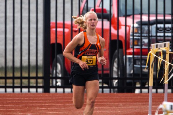 Lucy Rush Breaks School Record at Watkins Invitational