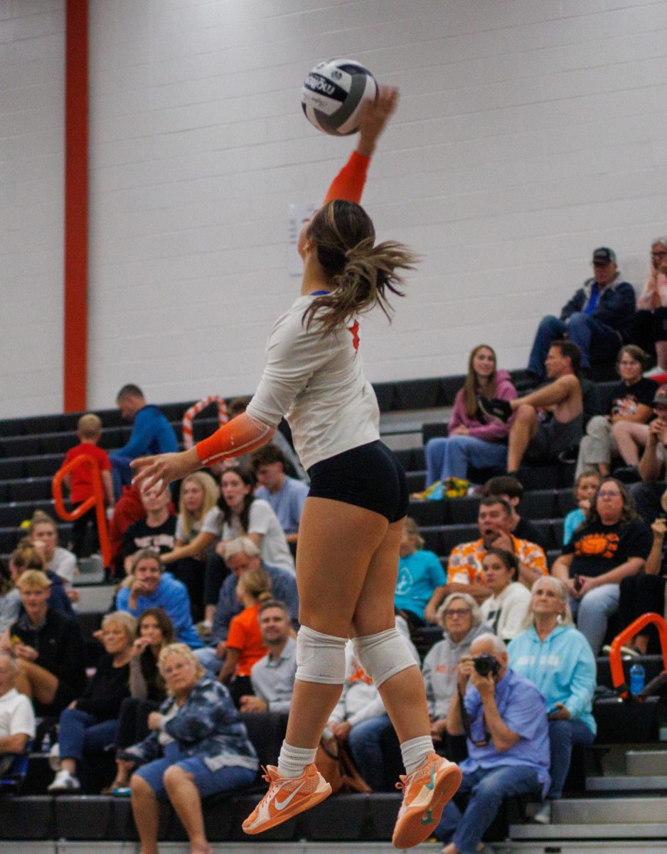 Sophomore Callie Swanson with a serve for an ace.