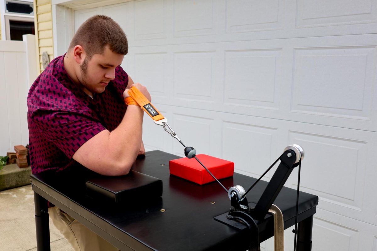 Gavin Zeiner prepares for the upcoming arm wrestling tournament