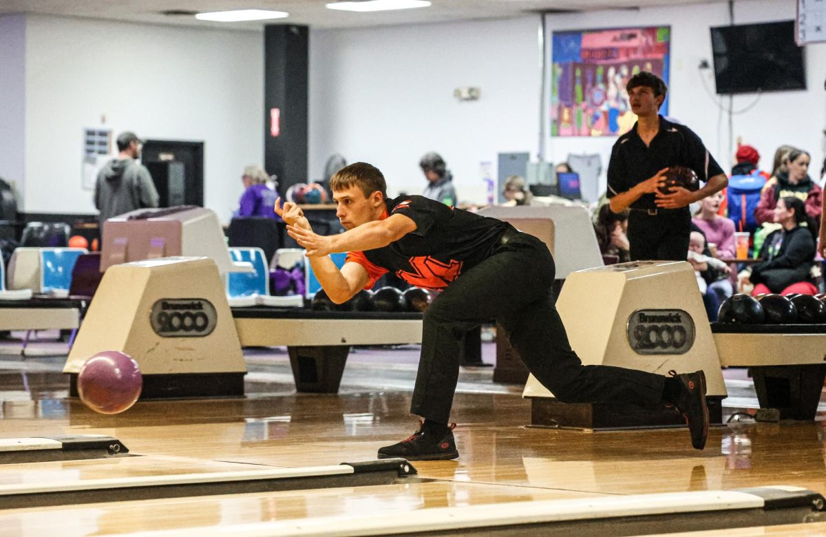 Locked in and balanced, junior Bryce Hollenback delivers a powerful release.